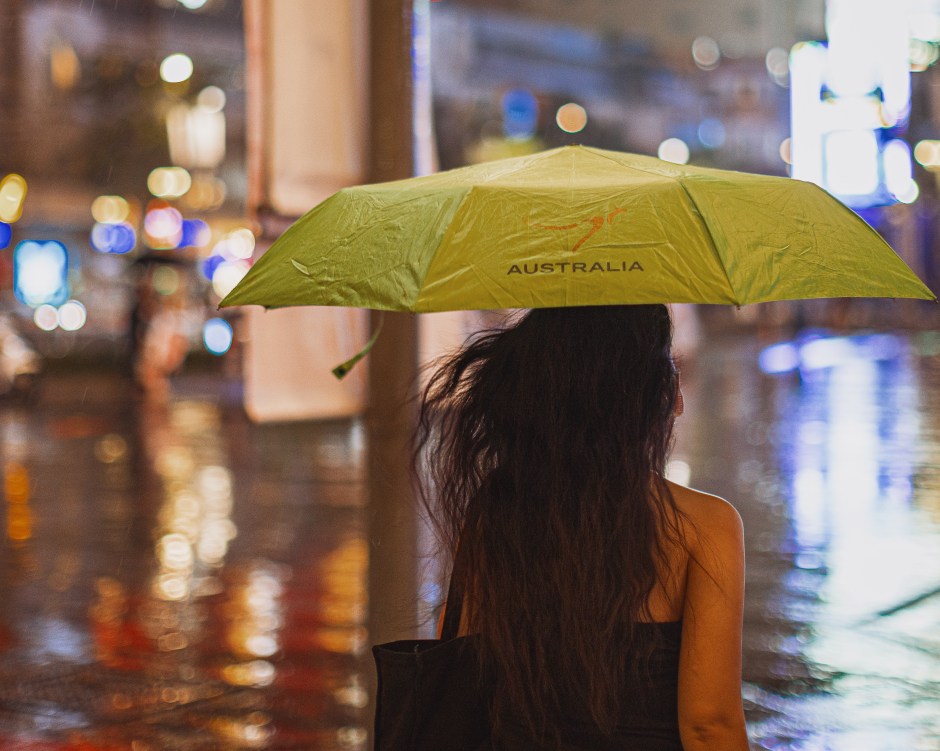 A woman with an umbrella in Saigon (HCMC) Vietnam.